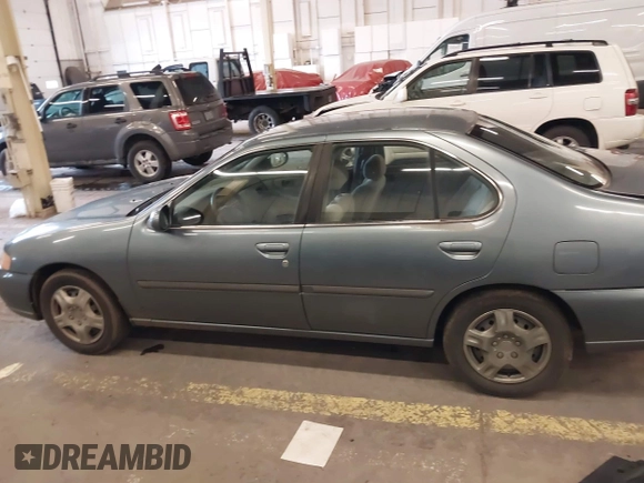 2000 Nissan Altima XE with VIN 1N4DL01D4YC185986, listed as a IAAI auction lot 41831774 with 217,044 mi miles. Bid and sale history available at carsss.com. Image 15.
