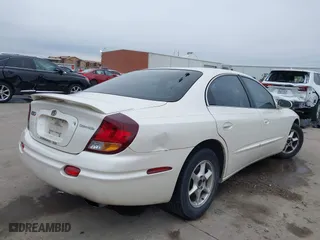 2002 Oldsmobile Aurora with VIN 1G3GR64H124127052, listed as a IAAI auction lot 41646711 with 198,141 mi miles. Bid and sale history available at carsss.com. Image 4.