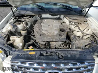 2005 Infiniti FX35 with VIN JNRAS08W75X218197, listed as a Copart auction lot 70484194 with 153,426 mi miles and Salvage Title. Bid and sale history available at carsss.com. Image 12.