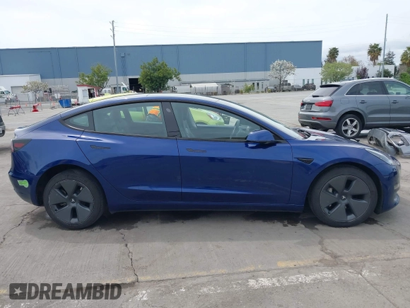 2021 Tesla Model 3 Long Range with VIN 5YJ3E1EB6MF878411, listed as a IAAI auction lot 41986947 with 71,978 mi miles and . Bid and sale history available at DreamBid. Image 14.