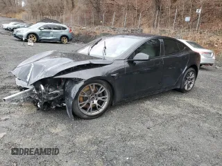 2022 Tesla Model S with VIN 5YJSA1E50NF493641, listed as a Copart auction lot 47185765 with 34,390 mi miles and Salvage Title. Bid and sale history available at DreamBid. Image 1.