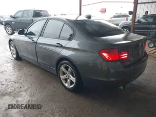 2014 BMW 3 Series 320i xDrive with VIN WBA3C3G5XENS67385, listed as a IAAI auction lot 42148360 with 98,216 mi miles and . Bid and sale history available at DreamBid. Image 3.