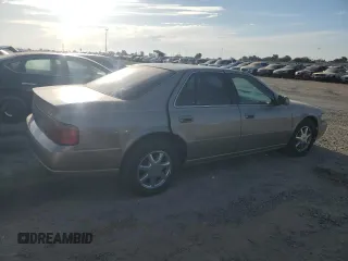 2002 Cadillac Seville Luxury SLS z VIN 1G6KS54Y22U149573, wystawiony jako Copart lot #71468564 z przebiegiem 158 498 mil mil oraz Czysty tytuł • Clean title. Historia ofert i sprzedaży dostępna na DreamBid. Obrazek 3.