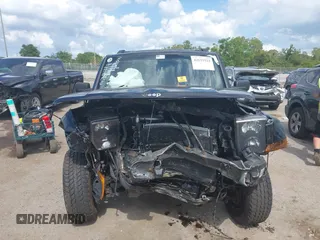 2007 Jeep Commander Sport with VIN 1J8HG48K57C505688, listed as a IAAI auction lot 42155522 with 216,505 mi miles and . Bid and sale history available at carsss.com. Image 12.