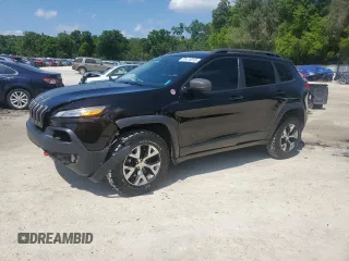 2017 Jeep Cherokee Trailhawk L Plus with VIN 1C4PJMBBXHW517252, listed as a Copart auction lot 51414315 with 185,274 mi miles and Salvage Title. Bid and sale history available at carsss.com. Image 1.