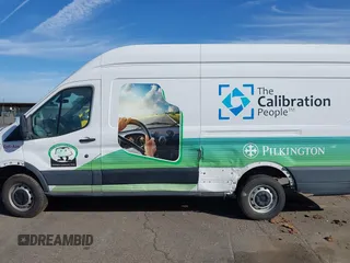 2019 Ford Transit Cargo with VIN 1FTBW3XM2KKB40981, listed as a IAAI auction lot 41558356 with 154,624 mi miles and . Bid and sale history available at DreamBid. Image 13.