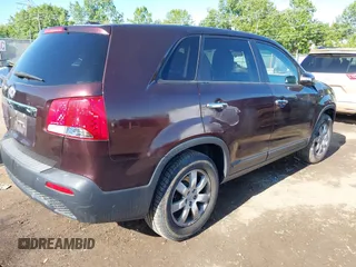 2013 Kia Sorento LX with VIN 5XYKT3A17DG375103, listed as a IAAI auction lot 42327291 with 228,761 mi miles and . Bid and sale history available at DreamBid. Image 4.