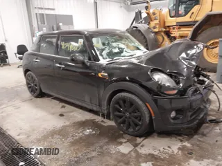 2017 MINI Hardtop 4 Door Cooper z VIN WMWXU1C34H2F78228, wystawiony jako IAAI lot #41549060 z przebiegiem 49 393 mil mil oraz . Historia ofert i sprzedaży dostępna na DreamBid. Obrazek 14.