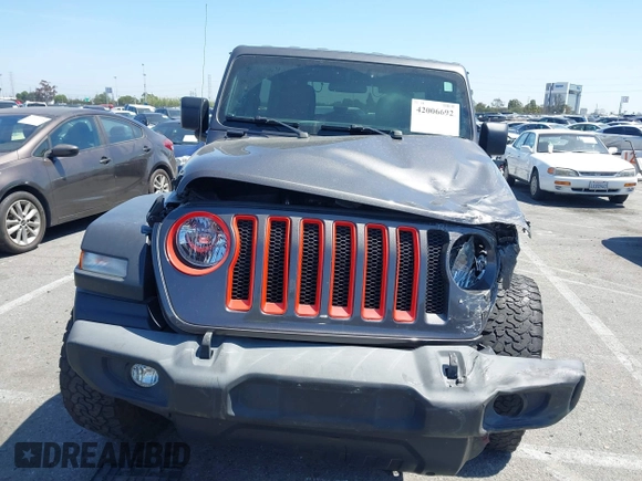 2020 Jeep Wrangler Unlimited Freedom z VIN 1C4HJXDG8LW338702, wystawiony jako IAAI lot #42006692 z przebiegiem 48 389 mil mil oraz . Historia ofert i sprzedaży dostępna na DreamBid. Obrazek 12.