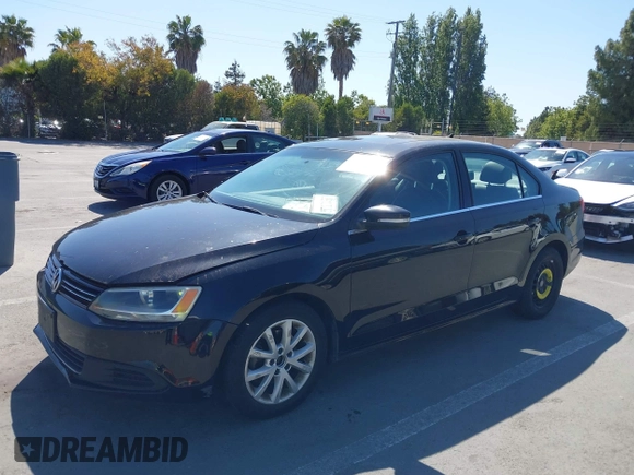 2014 Volkswagen Jetta SE with VIN 3VWD17AJ9EM372677, listed as a IAAI auction lot 42406449 with 266,331 mi miles and . Bid and sale history available at DreamBid. Image 6.