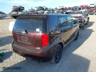 2010 Scion xB with VIN JTLZE4FE8A1113455, listed as a IAAI auction lot 40523410 with 1 mi miles. Bid and sale history available at carsss.com. Image 4.