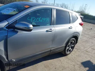 2018 Honda CR-V EX with VIN 7FARW2H56JE097214, listed as a IAAI auction lot 42061999 with 74,862 mi miles and . Bid and sale history available at DreamBid. Image 15.