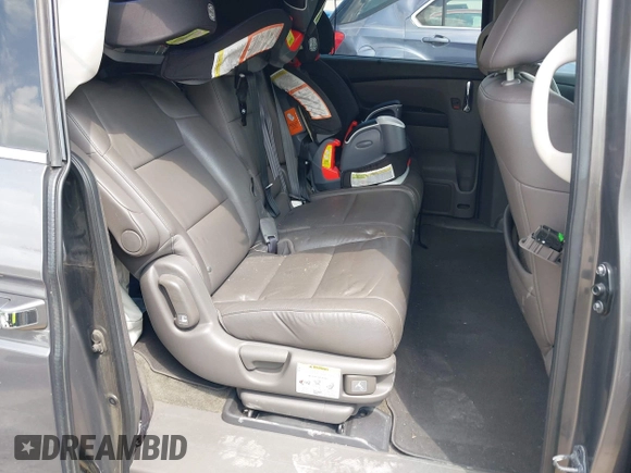 2014 Honda Odyssey Touring with VIN 5FNRL5H99EB138952, listed as a IAAI auction lot 42538833 with 146,959 mi miles and . Bid and sale history available at DreamBid. Image 8.