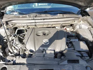 2019 Mazda CX-5 Grand Touring with VIN JM3KFBDM3K1677208, listed as a IAAI auction lot 41929299 with 58,163 mi miles. Bid and sale history available at carsss.com. Image 10.