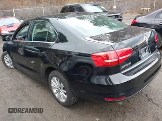 2015 Volkswagen Jetta Sedan 1.8T SE with VIN 3VWD17AJ3FM225093, listed as a IAAI auction lot 41974219 with 69,061 mi miles. Bid and sale history available at carsss.com. Image 3.