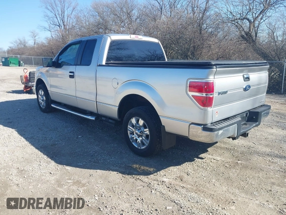 2011 Ford F-150 XL with VIN 1FTEX1CMXBFB22693, listed as a IAAI auction lot 41755565 with 123,982 mi miles. Bid and sale history available at carsss.com. Image 3.