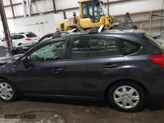 2014 Subaru Impreza Wagon 2.0i with VIN JF1GPAA65E8243773, listed as a IAAI auction lot 41236230 with 104,002 mi miles. Bid and sale history available at carsss.com. Image 14.