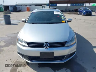 2014 Volkswagen Jetta TDI w/Premium with VIN 3VWLL7AJ6EM424935, listed as a IAAI auction lot 41533634 with 64,028 mi miles and . Bid and sale history available at DreamBid. Image 12.