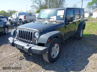 2018 Jeep Wrangler JK Unlimited Sport S with VIN 1C4HJWDG2JL886803, listed as a IAAI auction lot 41997238 with 113,926 mi miles. Bid and sale history available at carsss.com. Image 17.