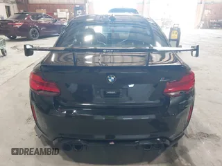 2020 BMW M2 Competition z VIN WBS2U7C09L7F85590, wystawiony jako IAAI lot #41836200 z przebiegiem 59 729 mil mil oraz . Historia ofert i sprzedaży dostępna na DreamBid. Obrazek 16.