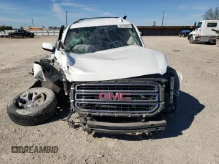 2015 GMC Yukon XL SLE z VIN 1GKS1GKC1FR643293, wystawiony jako Copart lot #82106544 z przebiegiem 164 623 mil mil oraz Szkoda całkowita • Salvage title. Historia ofert i sprzedaży dostępna na DreamBid. Obrazek 5.