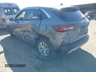 2023 Ford Escape Active with VIN 1FMCU0GZ1PUA35697, listed as a IAAI auction lot 41886290 with 82,824 mi miles and . Bid and sale history available at DreamBid. Image 3.