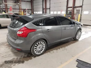 2012 Ford Focus Titanium with VIN 1FAHP3N27CL313288, listed as a IAAI auction lot 41741895 with 140,376 mi miles and . Bid and sale history available at carsss.com. Image 4.