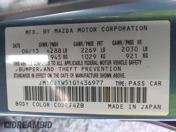 2016 Mazda Mazda6 i Grand Touring with VIN JM1GJ1W51G1436977, listed as a IAAI auction lot 42097363 with 128,941 mi miles. Bid and sale history available at carsss.com. Image 9.