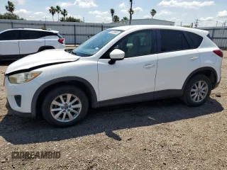 2014 Mazda CX-5 Touring with VIN JM3KE2CY9E0305244, listed as a Copart auction lot 56205605 with 164,516 mi miles and Salvage Title. Bid and sale history available at DreamBid. Image 1.