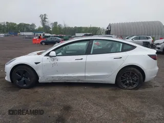 2023 Tesla Model 3 with VIN 5YJ3E1EA2PF626392, listed as a IAAI auction lot 42288413 with 25,605 mi miles and . Bid and sale history available at DreamBid. Image 14.