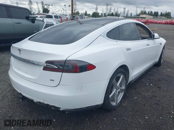 2013 Tesla Model S с VIN 5YJSA1CN0DFP31750, выставлен на аукционе IAAI как лот 41911343 с пробегом 209 664 миль миль и . История ставок и продаж доступна на DreamBid. Изображение 4.