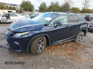 2017 Lexus RX with VIN 2T2BZMCAXHC063422, listed as a IAAI auction lot 41130585 with 63,883 mi miles. Bid and sale history available at carsss.com. Image 2.