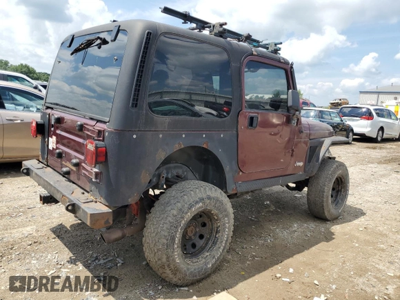 2002 Jeep Wrangler X with VIN 1J4FA39SX2P732881, listed as a Copart auction lot 64451185 with Not provided miles and Clean title. Bid and sale history available at DreamBid. Image 3.