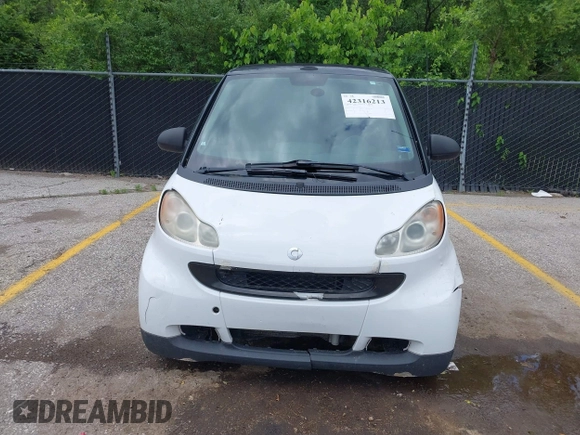 2009 Smart fortwo Passion z VIN WMEEK31X79K210918, wystawiony jako IAAI lot #42316213 z przebiegiem 99 667 mil mil oraz . Historia ofert i sprzedaży dostępna na DreamBid. Obrazek 6.