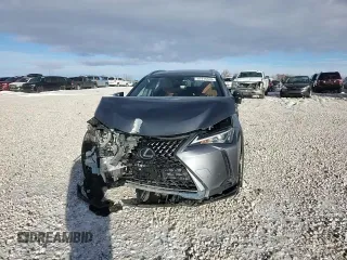 2021 Lexus UX 250h z VIN JTHX9JBH8M2047296, wystawiony jako Copart lot #87916535 z przebiegiem 10 297 mil mil oraz Szkoda całkowita • Salvage title. Historia ofert i sprzedaży dostępna na DreamBid. Obrazek 10.