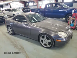 2003 Mercedes-Benz SLK 320 with VIN WDBKK65F83F280656, listed as a Copart auction lot 79158954 with 99,413 mi miles and Salvage title. Bid and sale history available at DreamBid. Image 4.