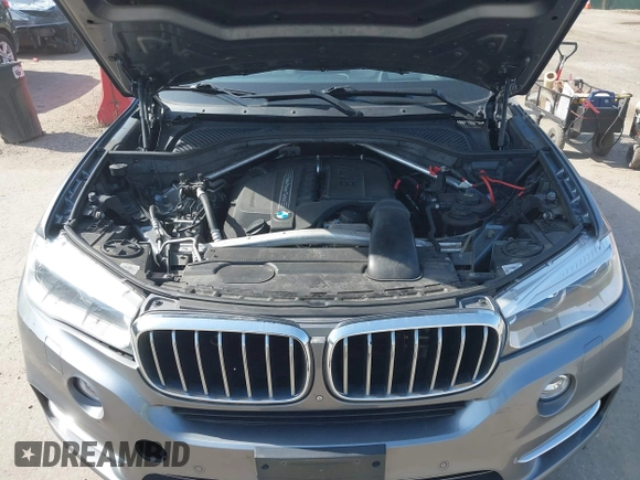 2015 BMW X5 xDrive35i with VIN 5UXKR0C53F0K60910, listed as a IAAI auction lot 41857733 with 153,583 mi miles. Bid and sale history available at carsss.com. Image 10.