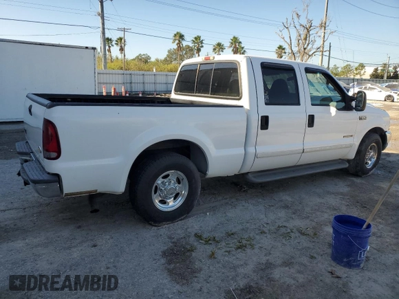 2001 Ford Super Duty F-250 XL with VIN 1FTNW20F61EB42376, listed as a Copart auction lot 74001054 with 215,944 mi miles and Salvage Title. Bid and sale history available at carsss.com. Image 3.