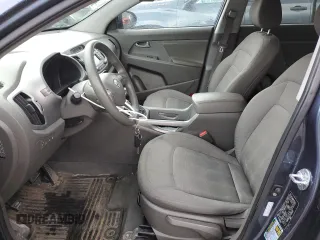 2012 Kia Sportage LX with VIN KNDPBCA25C7285039, listed as a Copart auction lot 52620735 with 197,305 mi miles and Salvage title. Bid and sale history available at DreamBid. Image 7.