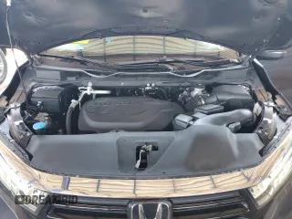 2021 Honda Odyssey Touring with VIN 5FNRL6H88MB040703, listed as a Copart auction lot 60340095 with 66,171 mi miles and Salvage title. Bid and sale history available at DreamBid. Image 12.