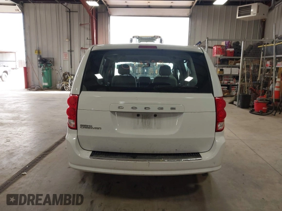 2014 Dodge Grand Caravan American Value with VIN 2C4RDGBG7ER345277, listed as a IAAI auction lot 42061355 with 145,889 mi miles and . Bid and sale history available at DreamBid. Image 16.