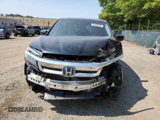 2019 Honda Pilot EX-L with VIN 5FNYF5H5XKB031517, listed as a Copart auction lot 59430655 with 64,929 mi miles and Salvage title. Bid and sale history available at DreamBid. Image 5.