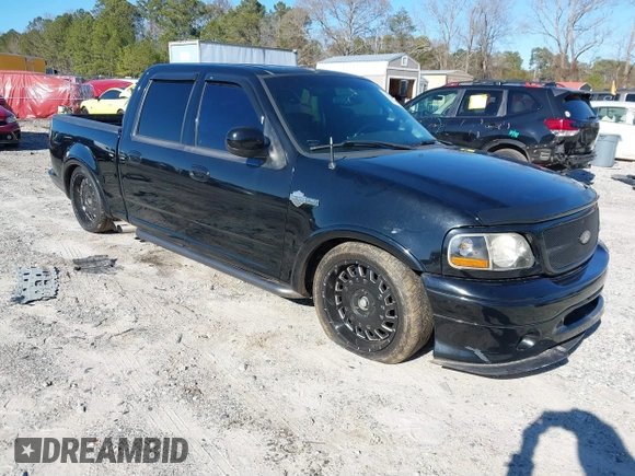 2002 Ford F-150 Harley Davidson with VIN 1FTRW07312KC24102, listed as a IAAI auction lot 41591917 with 1 mi miles. Bid and sale history available at carsss.com. Image 1.