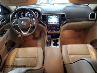 2017 Jeep Grand Cherokee Overland z VIN 1C4RJFCG8HC809868, wystawiony jako Copart lot #64056155 z przebiegiem 54 136 mil mil oraz Szkoda całkowita • Salvage title. Historia ofert i sprzedaży dostępna na DreamBid. Obrazek 8.