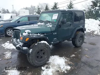 2003 Jeep Wrangler X with VIN 1J4FA39S13P310046, listed as a IAAI auction lot 41555652 with 177,503 mi miles and . Bid and sale history available at DreamBid. Image 18.