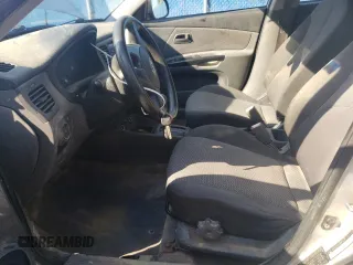 2011 Kia Rio with VIN KNADH4B32B6915275, listed as a Copart auction lot 71546484 with 297,998 mi miles and Salvage Title. Bid and sale history available at DreamBid. Image 7.
