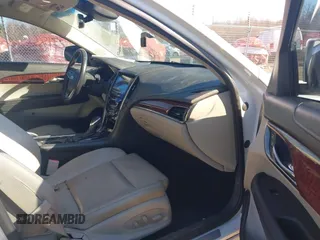 2016 Cadillac ATS Sedan Luxury Collection AWD with VIN 1G6AH5SX5G0106431, listed as a IAAI auction lot 41844622 with 124,759 mi miles. Bid and sale history available at carsss.com. Image 5.