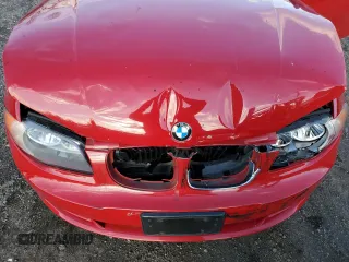 2010 BMW 1 Series 128i with VIN WBAUL7C54AVJ77712, listed as a Copart auction lot 83158294 with Not provided miles and Salvage title. Bid and sale history available at DreamBid. Image 12.