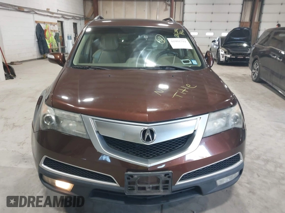 2011 Acura MDX Tech Pkg with VIN 2HNYD2H66BH541588, listed as a IAAI auction lot 42002712 with 216,298 mi miles. Bid and sale history available at carsss.com. Image 12.