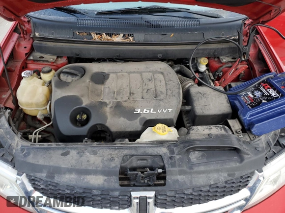2013 Dodge Journey SXT with VIN 3C4PDDBG1DT593302, listed as a Copart auction lot 44517955 with 176,136 mi miles and Salvage title. Bid and sale history available at DreamBid. Image 12.